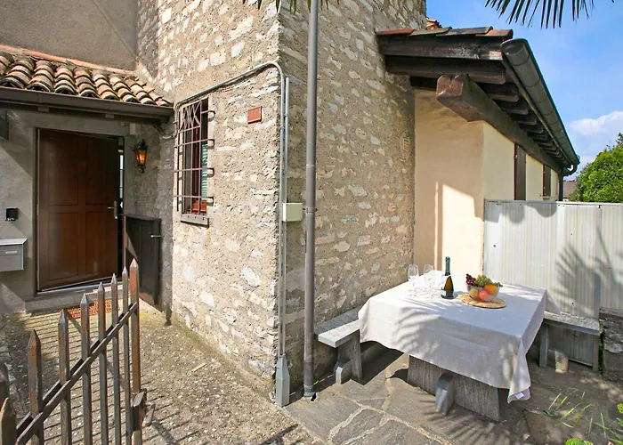 Angelina: Panoramic Lake View House On Monte Bre | Terrace & Balcony - Happy Rentals